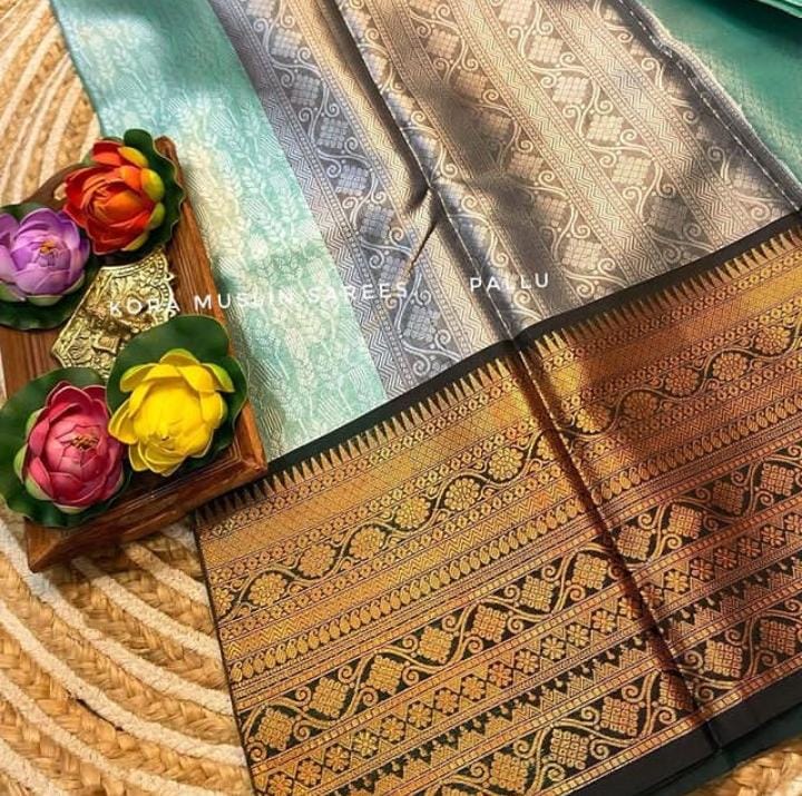 Women's kanjeevaram pattu kora muslin with gold zari weaving skirt border saree