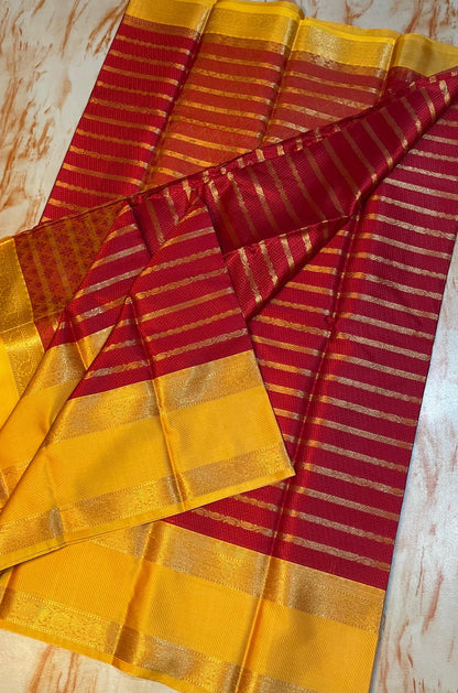 Elegent Kanjeevaram Stipe pattern Kora muslin Red saree with Yellow Skirt Border traditional saree
