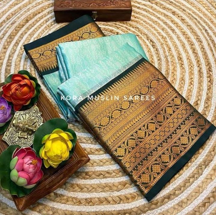 Women's kanjeevaram pattu kora muslin with gold zari weaving skirt border saree