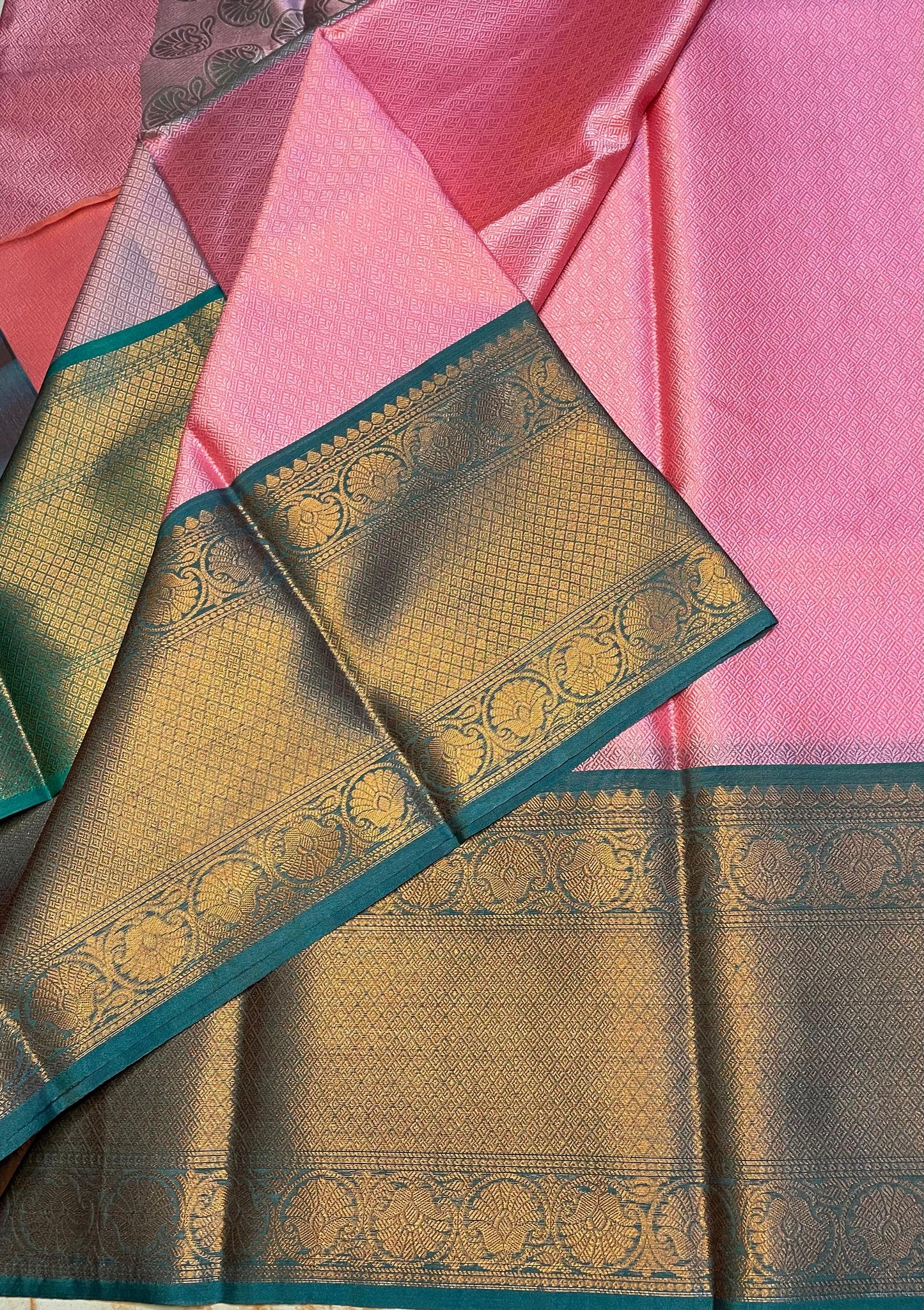 Baby pink Classy look kora muslin saree with green skirt zari weaving border