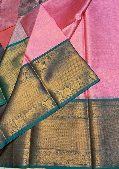 Baby pink Classy look kora muslin saree with green skirt zari weaving border