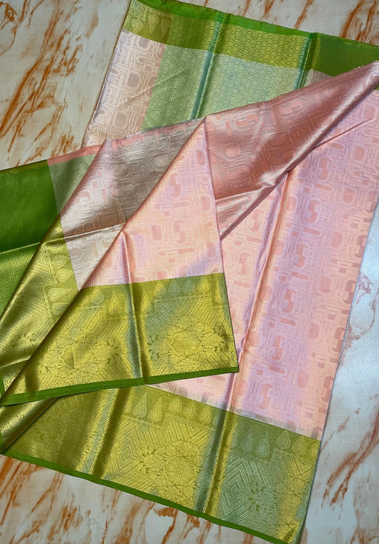 Pretty women's light pink saree with green Skirt zari weaving border