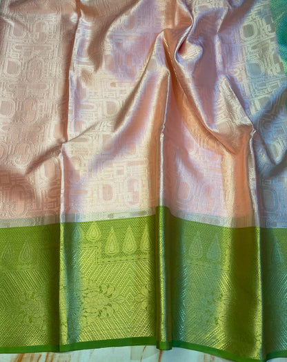 Pretty women's light pink saree with green Skirt zari weaving border